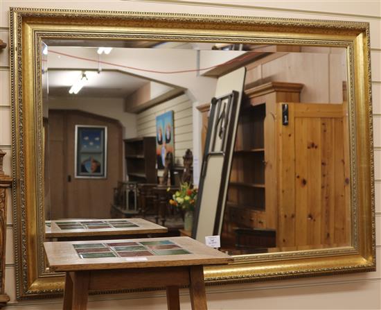 A gilt rectangular wall mirror, W.104cm